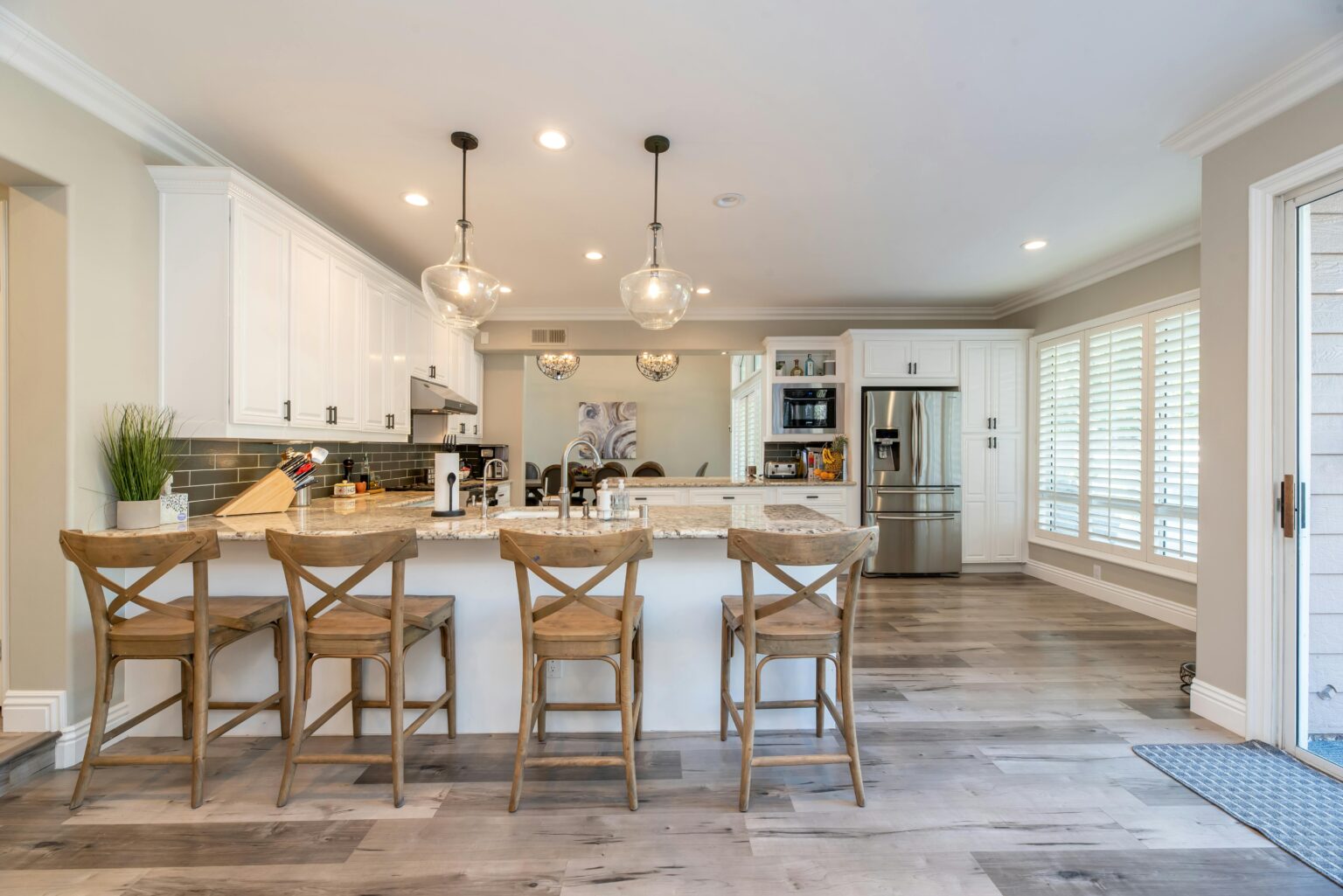 kitchen interior featuring stools and modern design elements.